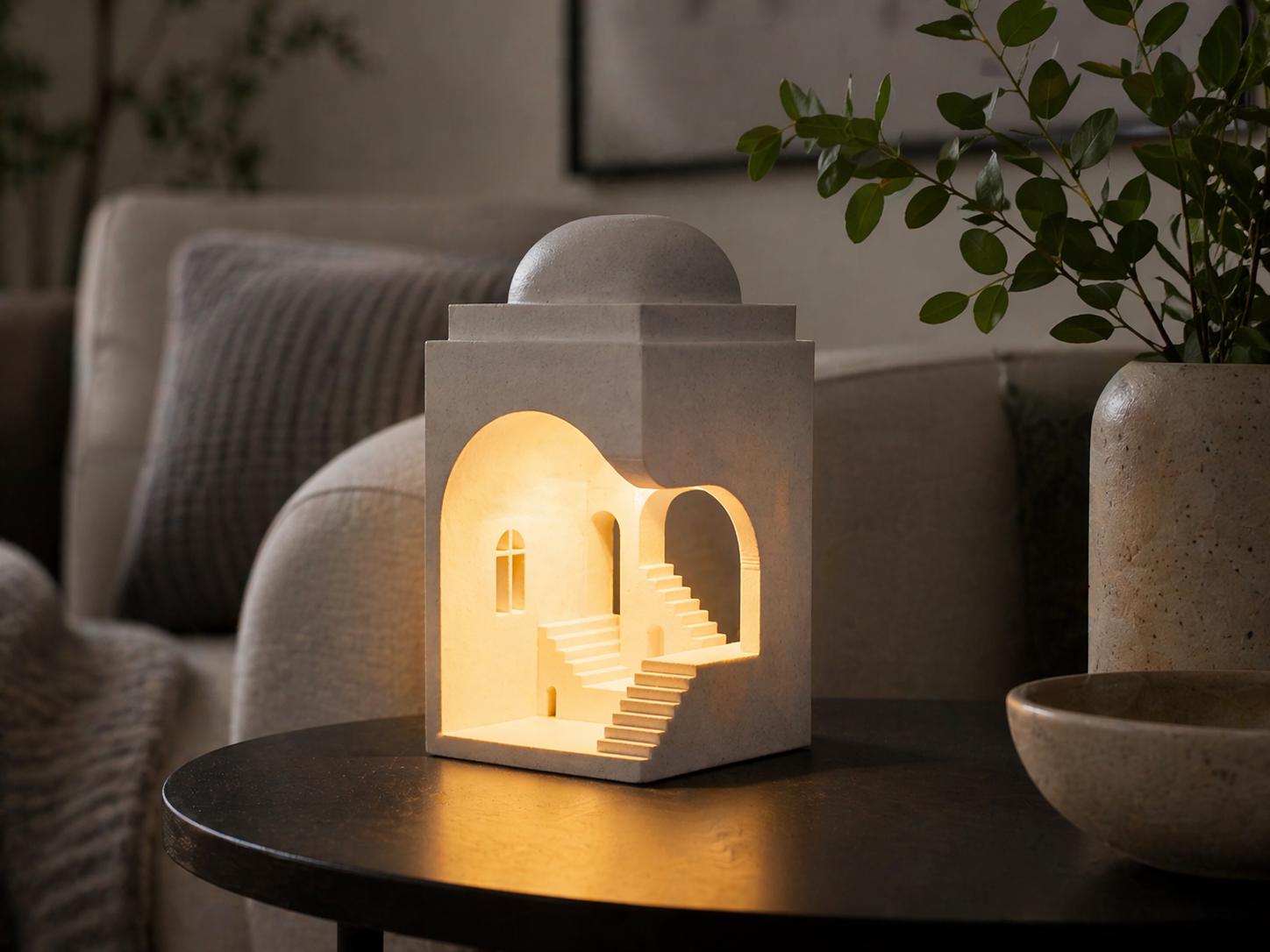 Warm architectural lamp in a softly styled living room.